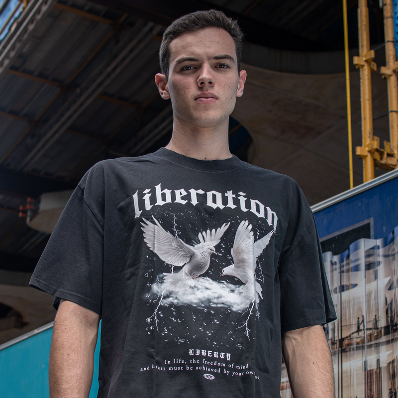 Model displaying streetwear birds t-shirt