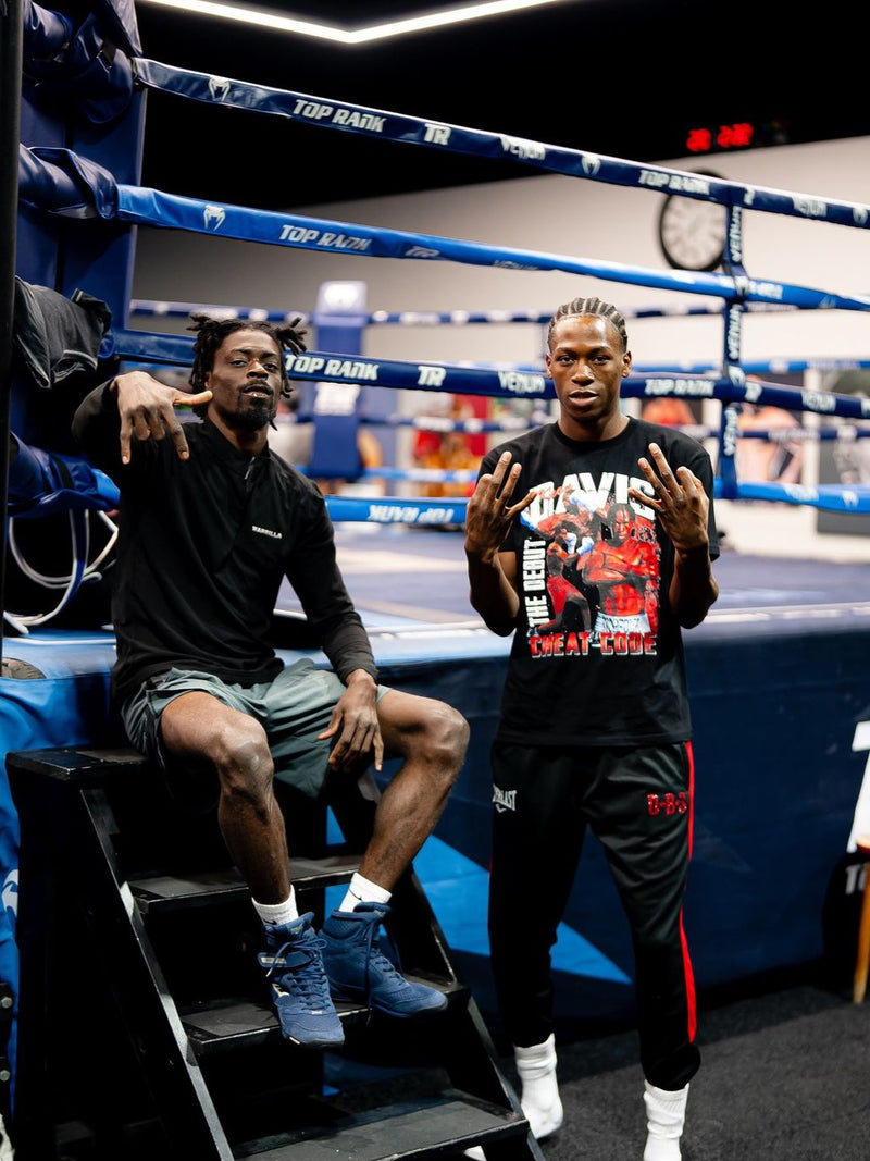 Keon Davis with Kelvin wearing Homecoming T-Shirt