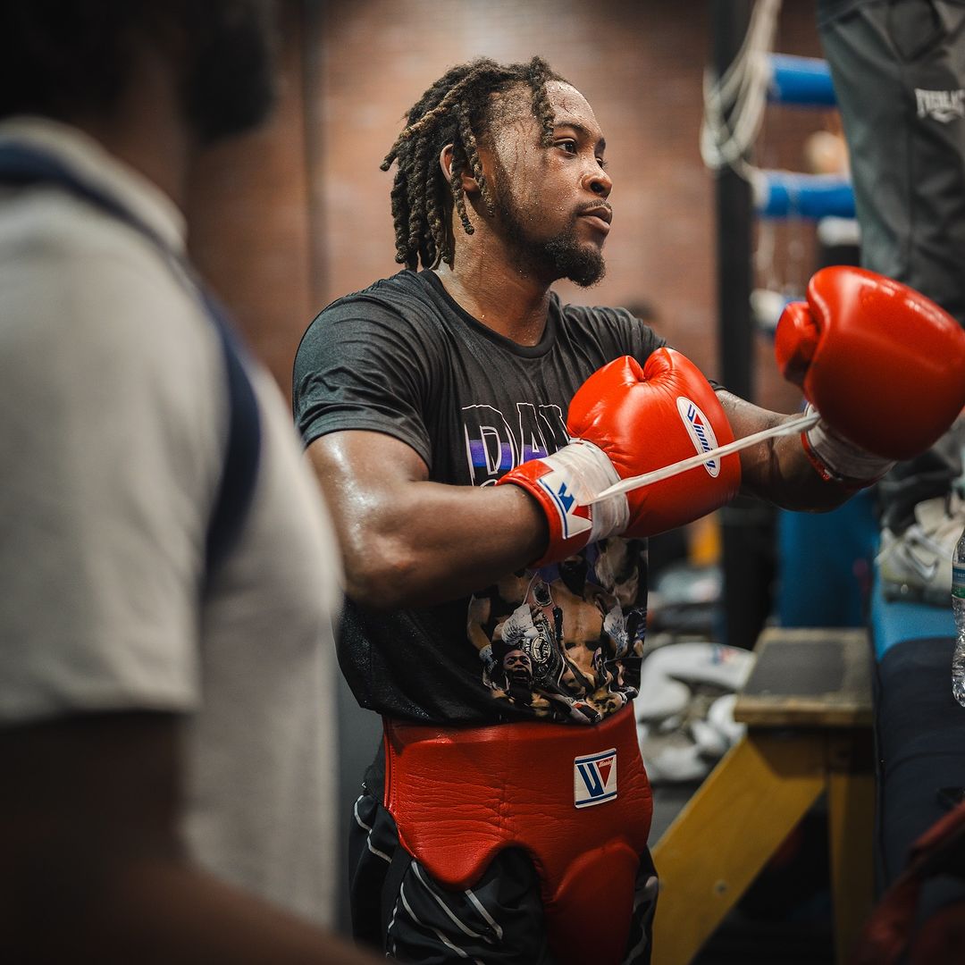 Keyshawn Davis wearing AKC Supporter T-shirt
