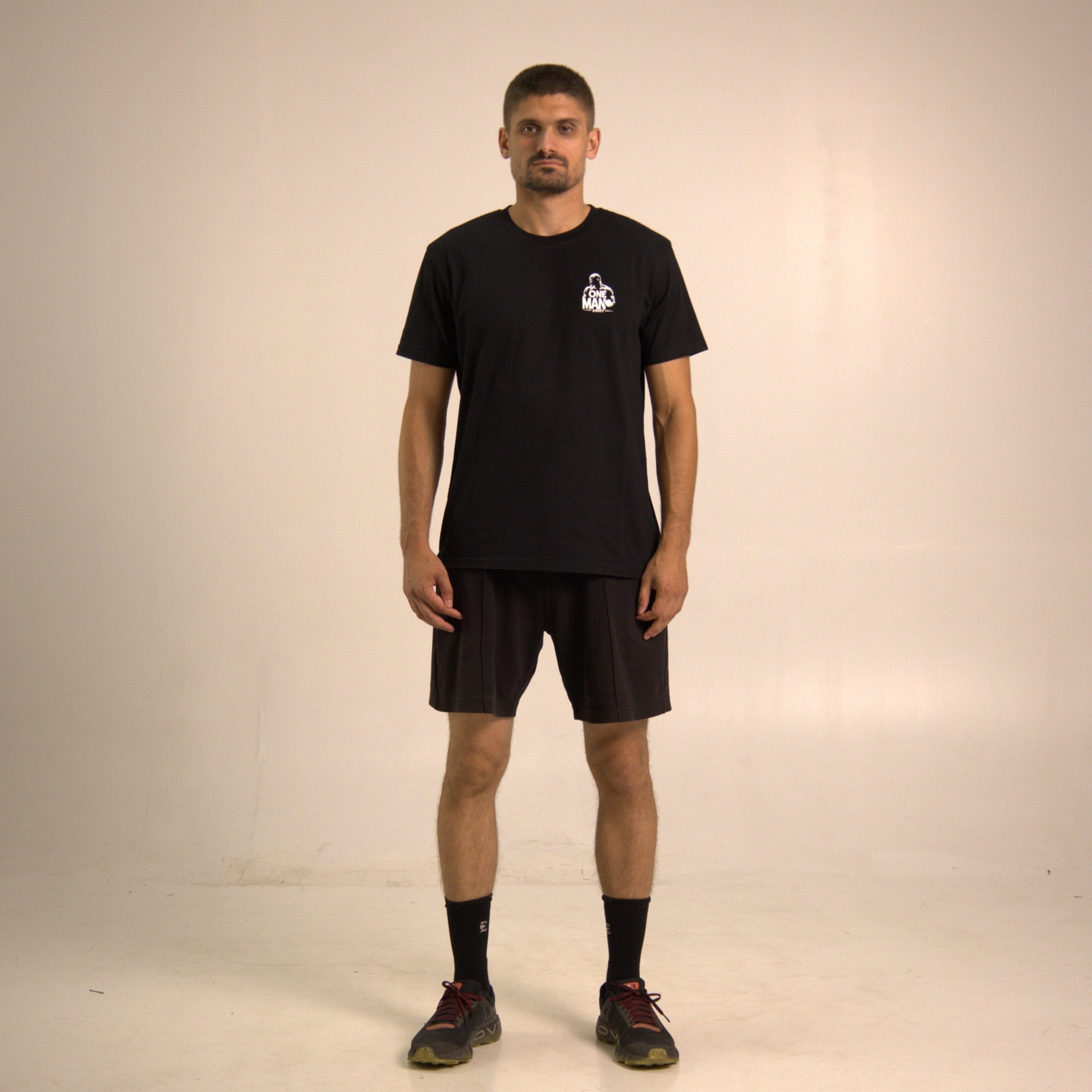 Model wearing simple boxing tee