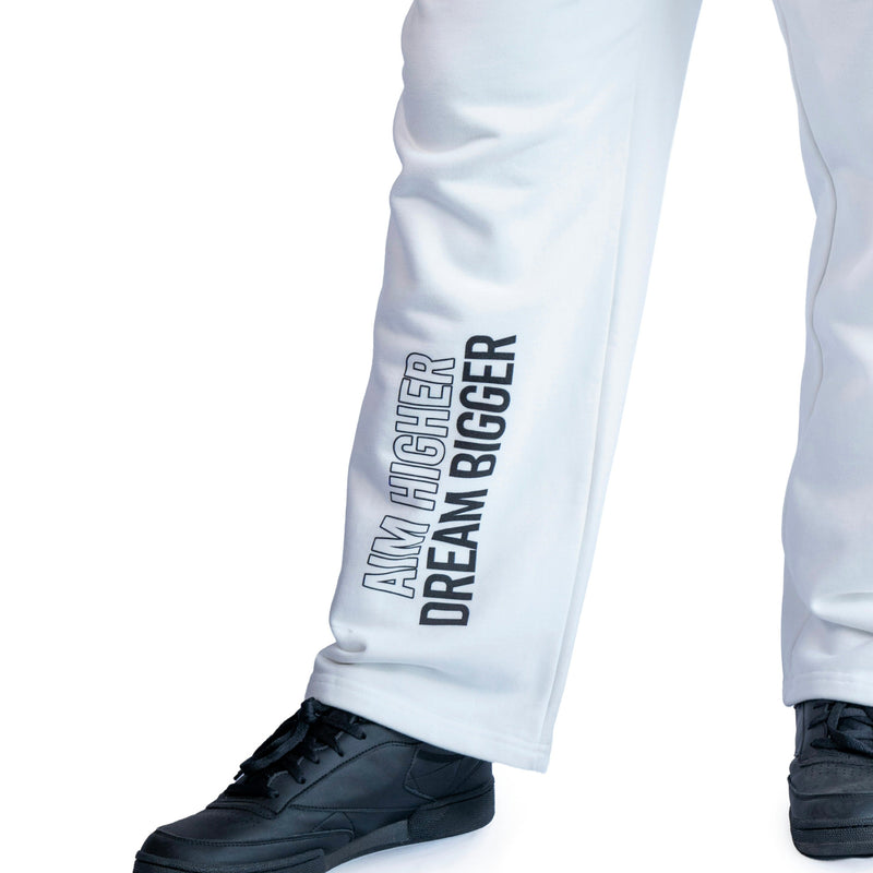 AKC Core White Relaxed Fleece Bottoms Worn by Model - Left Front Close-Up Shot