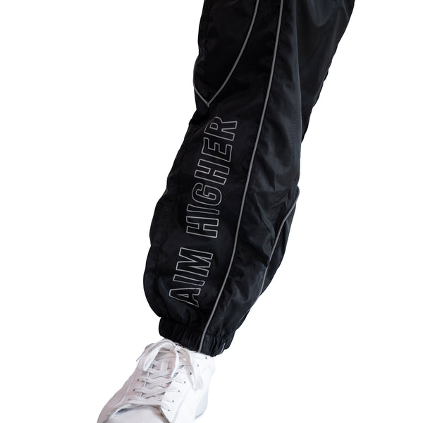 AKC Nightfall Reflective Pants Worn by Model - Left Front Close-Up Shot