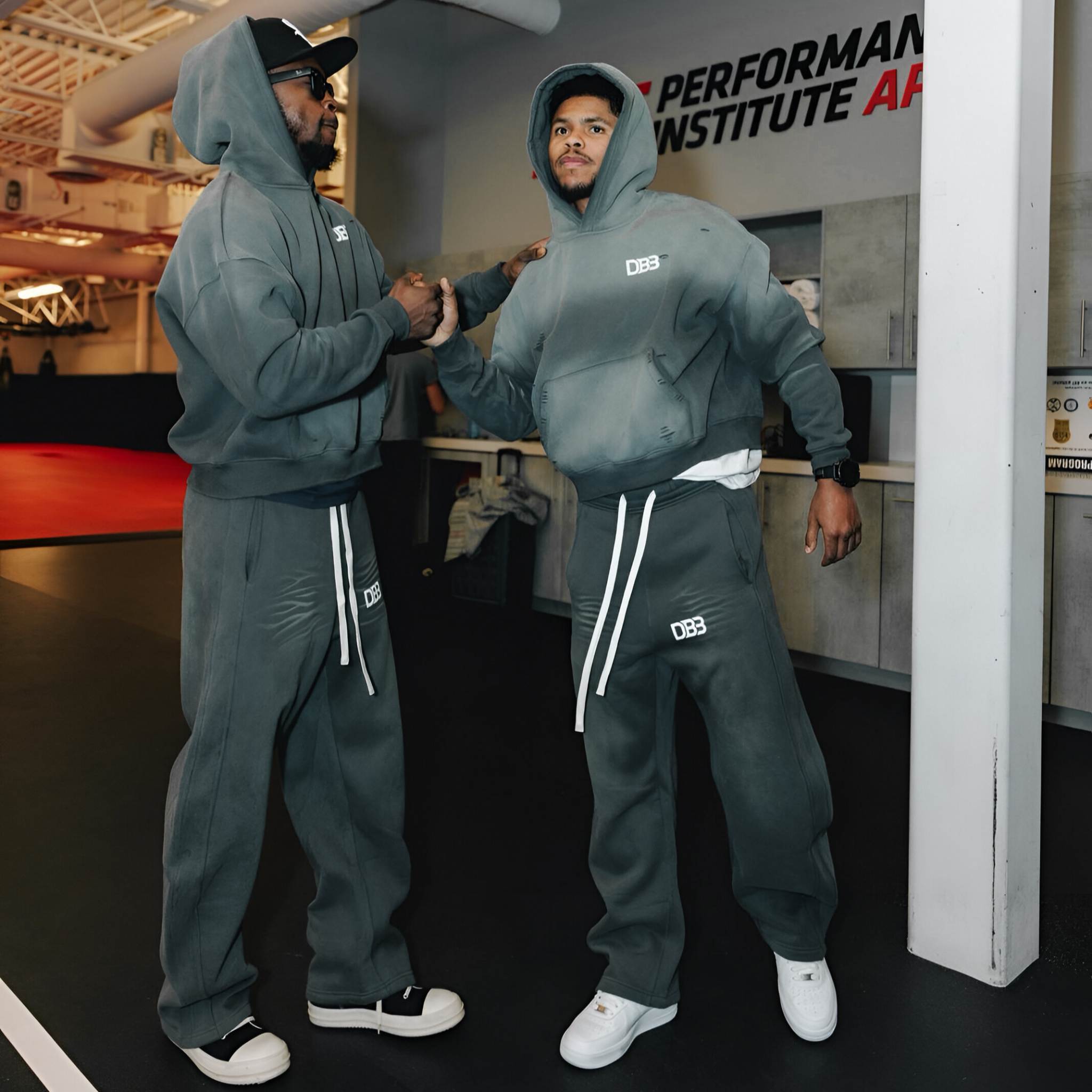 Keyshawn Davis and Shakur Stevenson wearing gray DB3 Distressed Sweatpants with matching hoodie