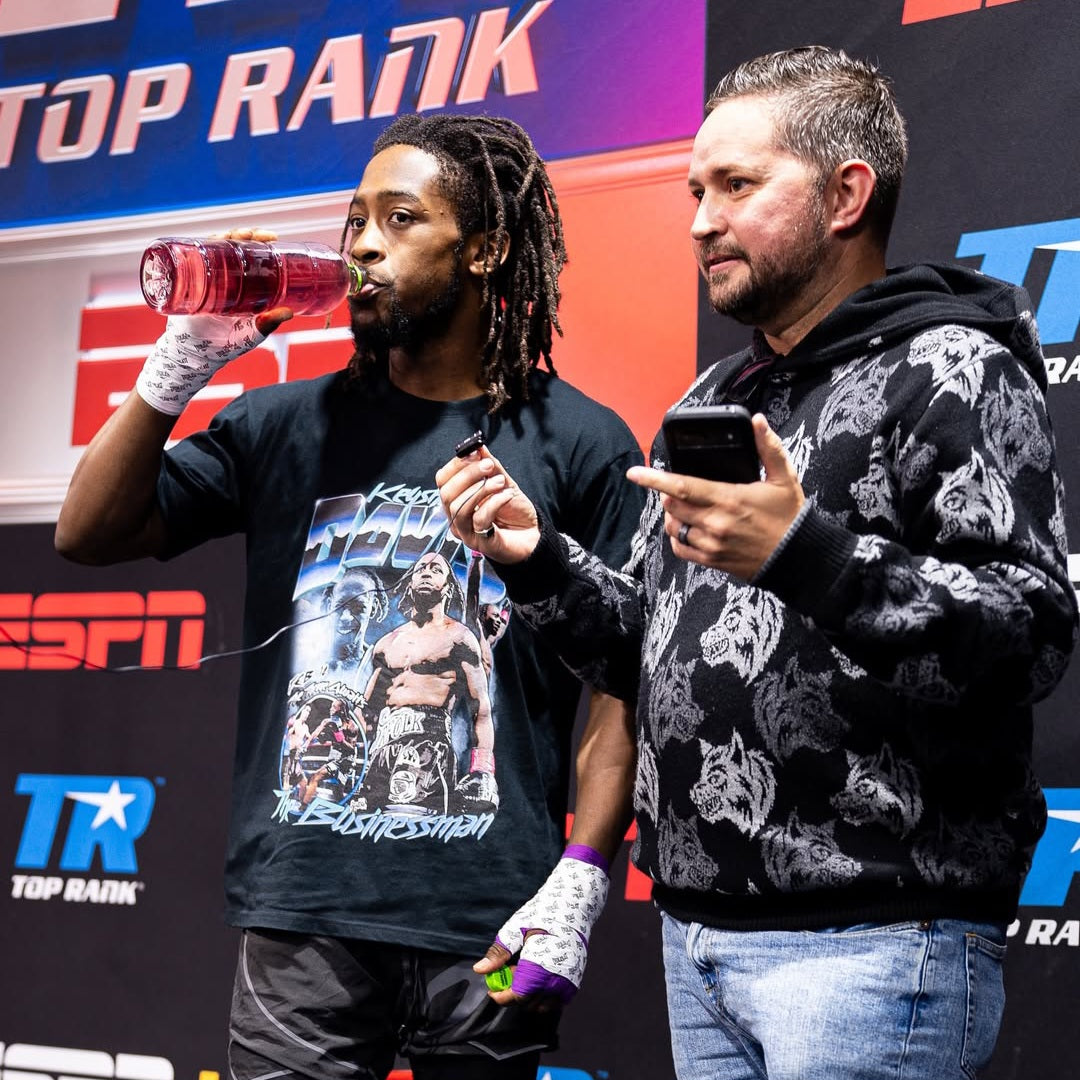 Keyshawn Davis wearing black World Title Edition Supporter Tee - Front