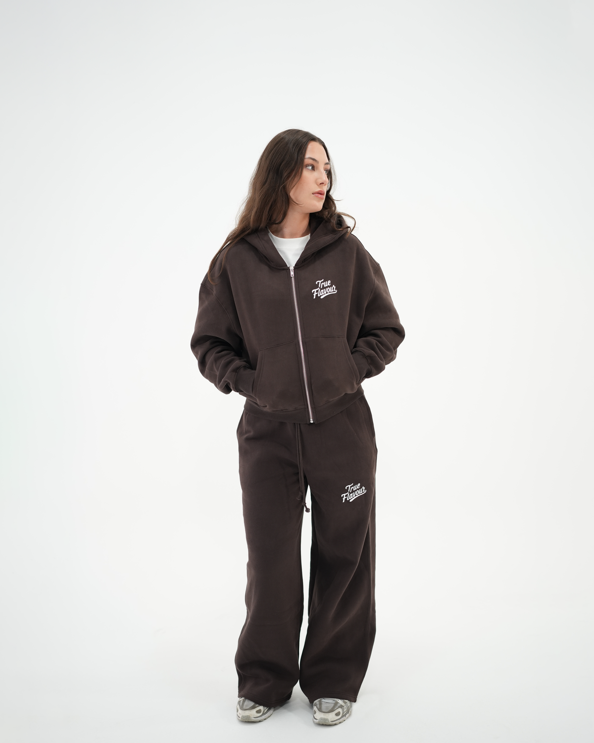 True Flavour Cropped Oversized Hoodie in brown worn by female model - Front (Full Body)