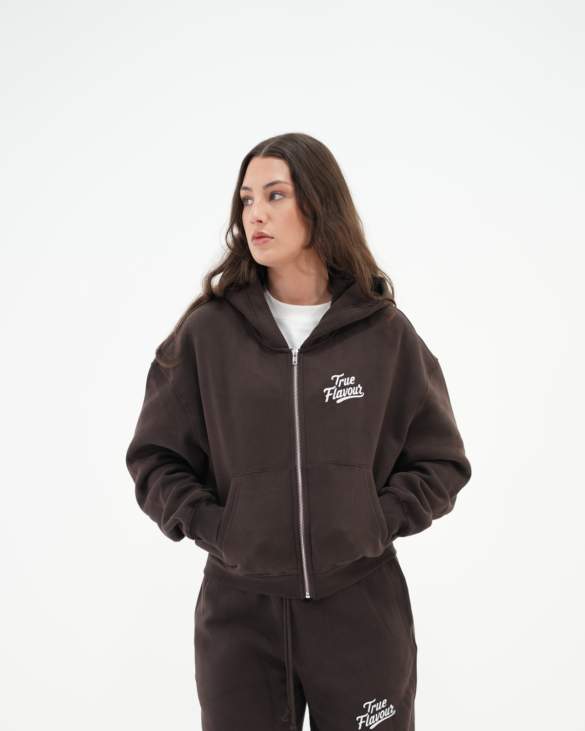 True Flavour Cropped Oversized Hoodie in brown worn by female model - Front (Main)