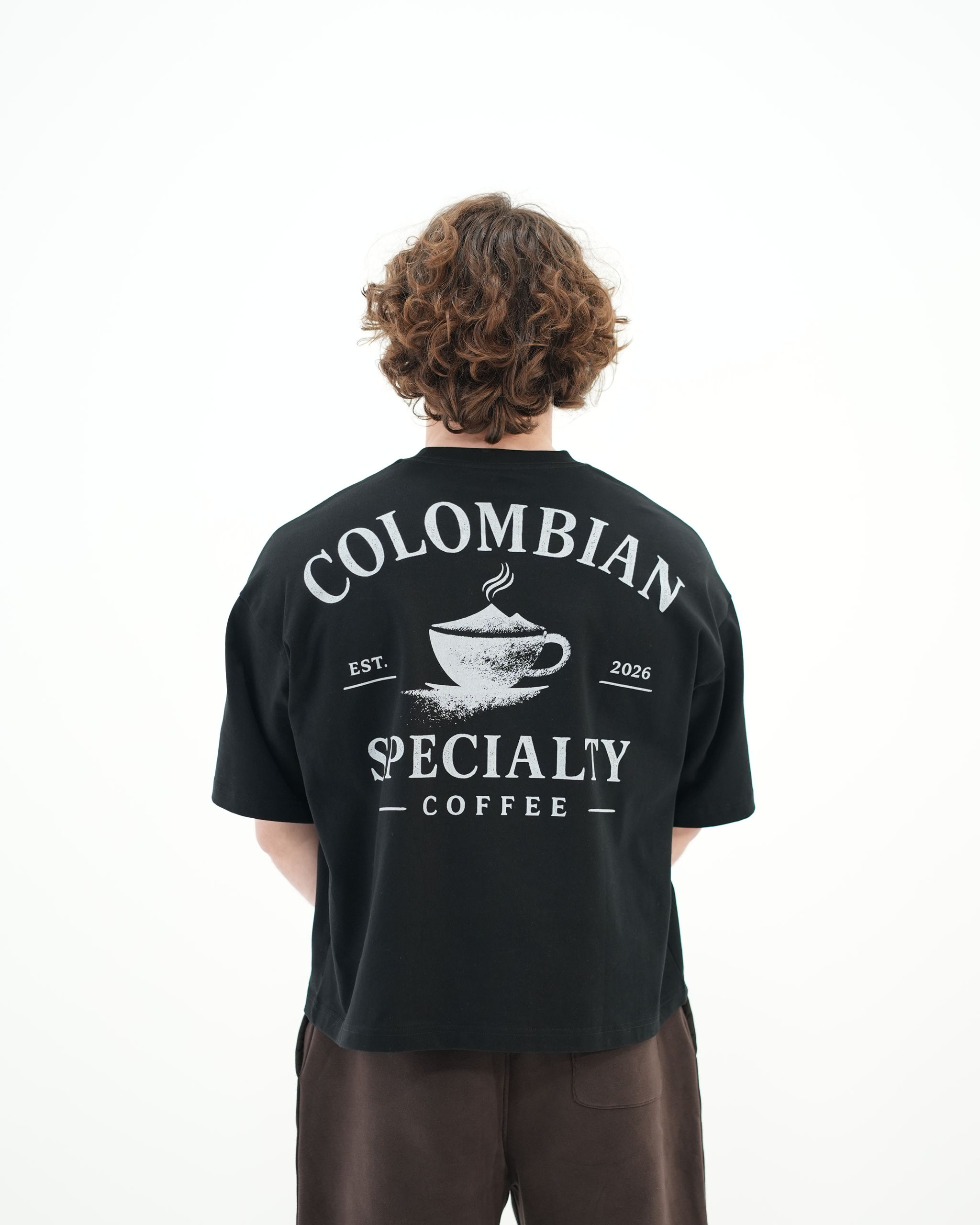 True Flavour Cropped Oversized Tee in black worn by model - Back (Main)