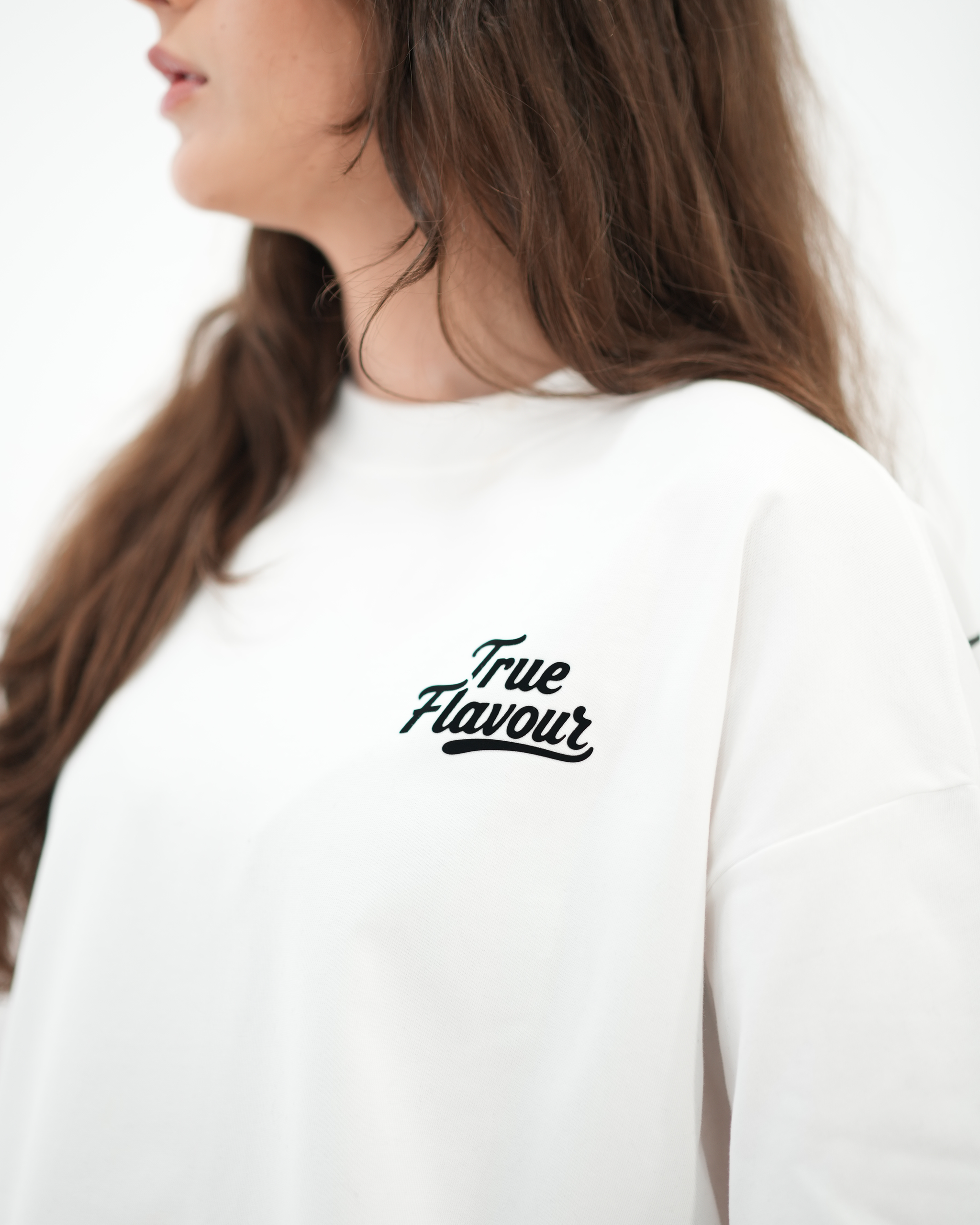 True Flavour Cropped Oversized Tee in white worn by model - Front (Close-Up)