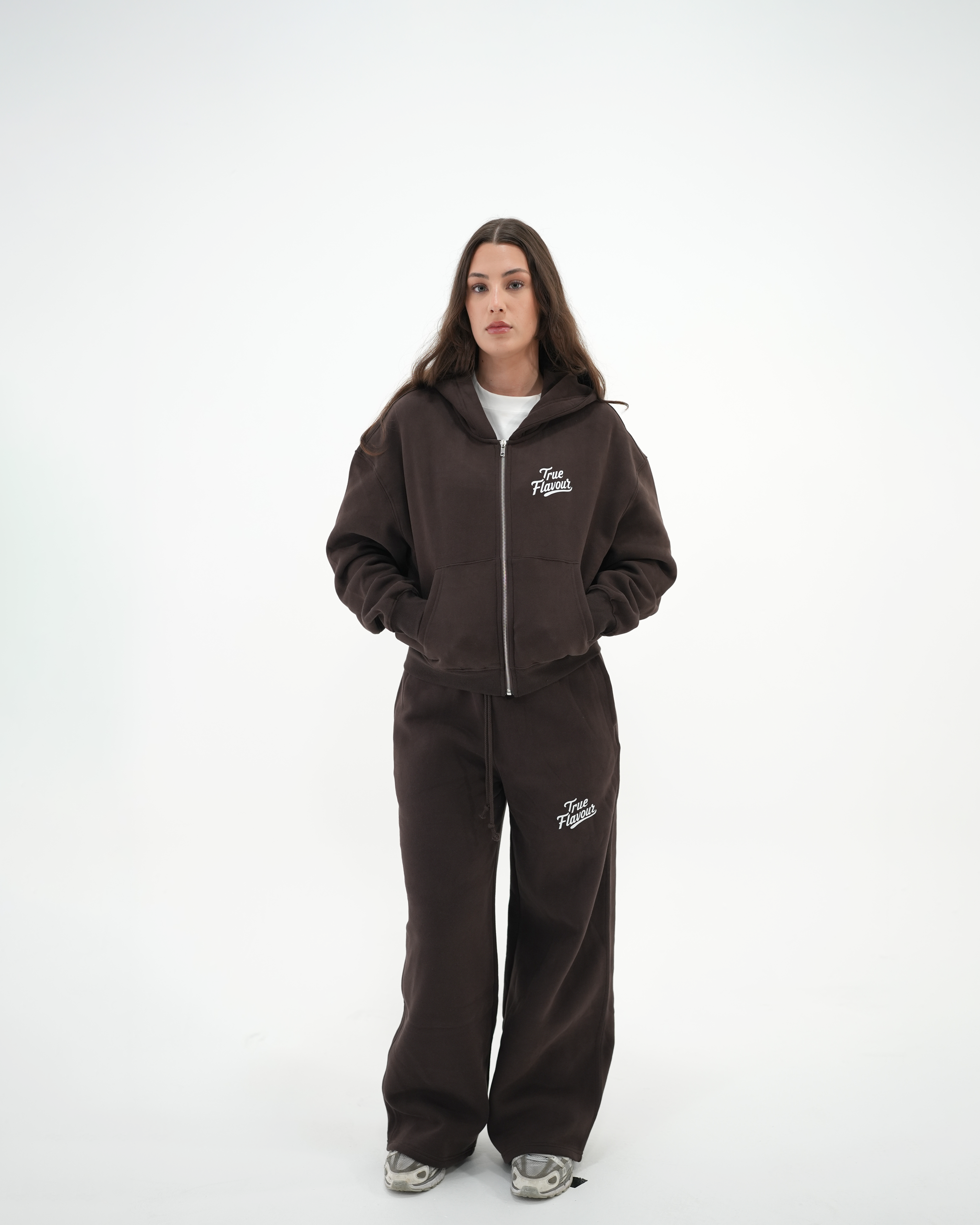 True Flavour Relaxed Straight Leg Sweatpants in brown worn by female model - Front (Full Body)